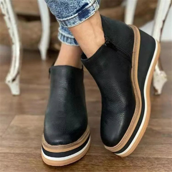 Kinsley Lagoon Ankle Boots – Black